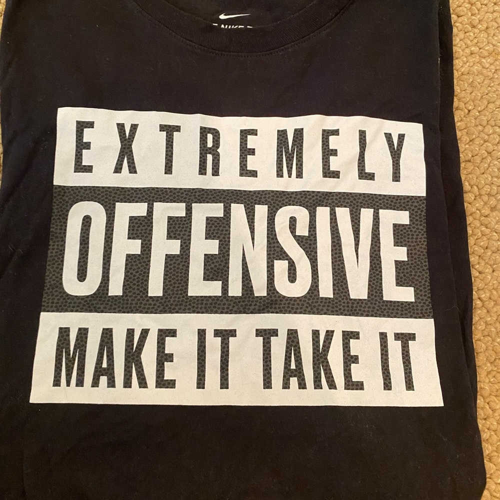 A black Nike T-Shirt